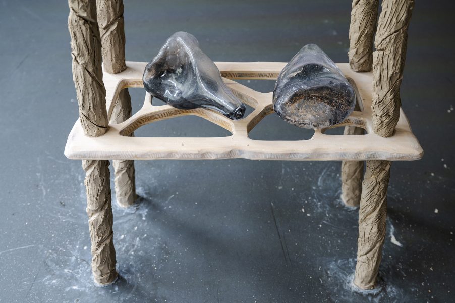 Constricted lungs and plinth, 2022, installation detail (dimensions variable), blown glass, sand, unfired clay, wood, wax, water